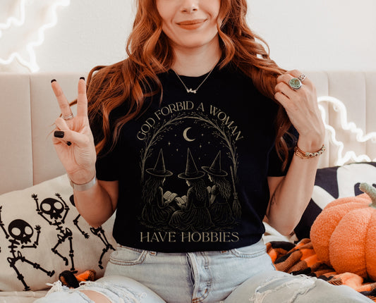 Witchy Humor T-Shirt for Her | God Forbid a Woman Have Hobbies Shirt | Gift for Witches, Funny Witch Shirt, Halloween Tee, Unisex [...]